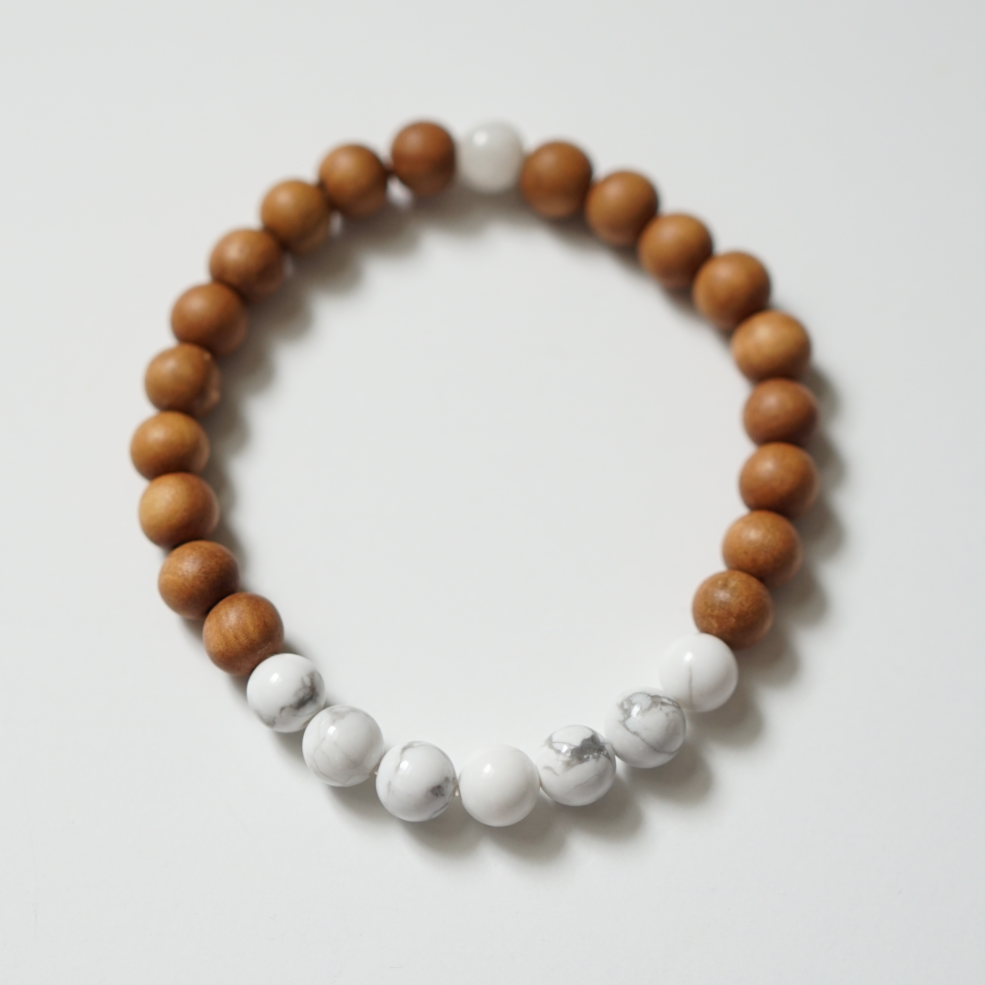 The Transendence Mala bracelet is made by women living in rural villages in India who have no other employable skills or economic opportunities.