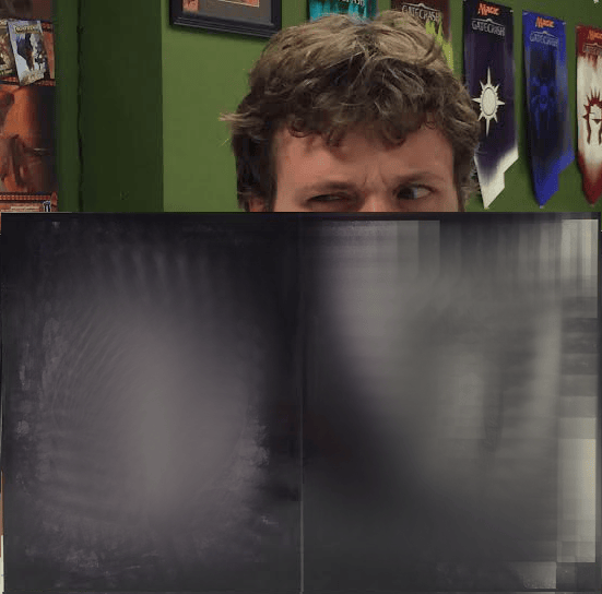 Peeking over the screen.