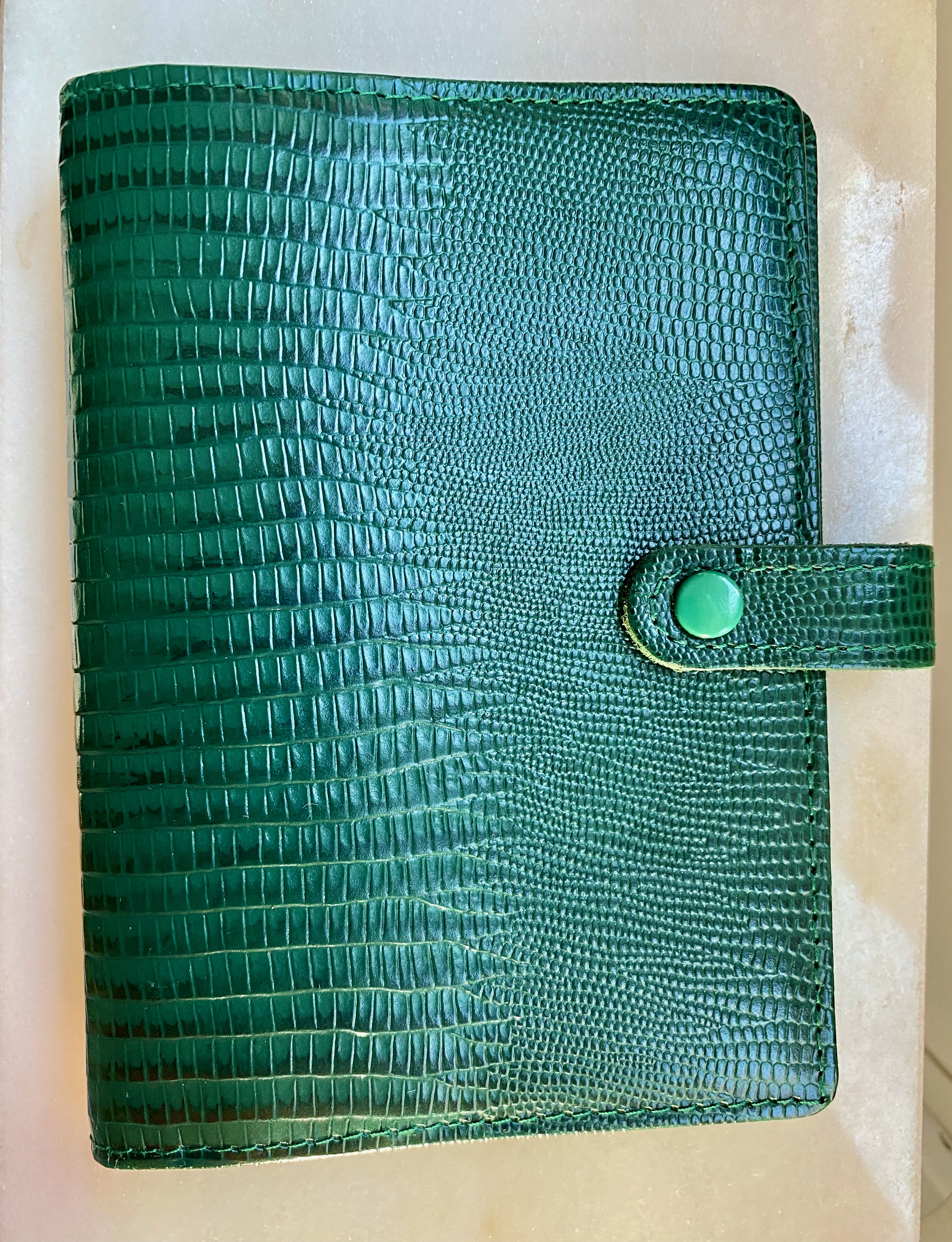 Green pocketsized Filofax Tejus