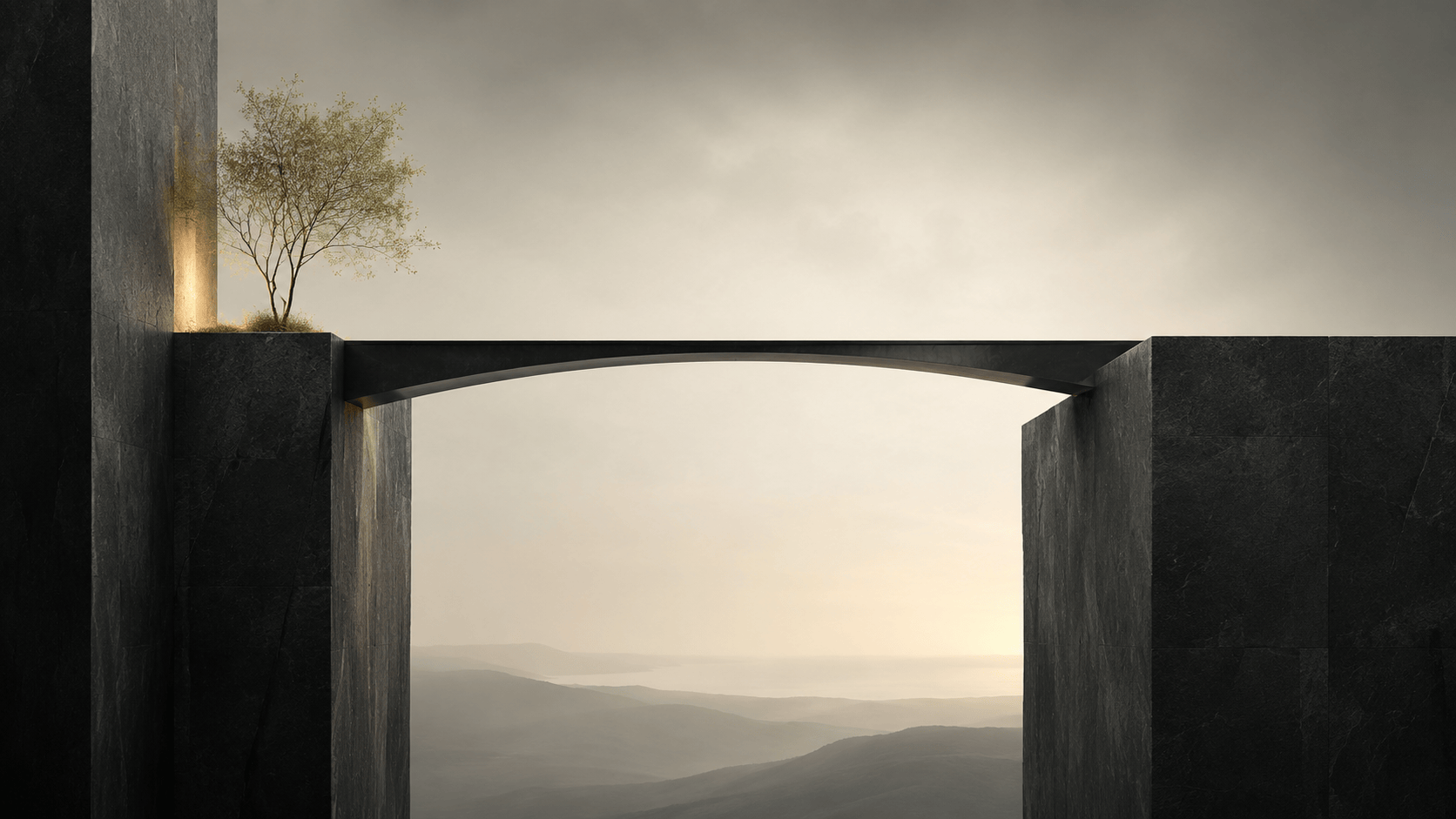 A dark stone bridge spanning two structures, with a lone tree and open landscape beyond.