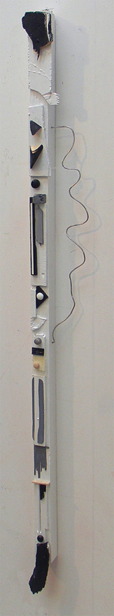 Wood with chips of painted wood and wire. 58" high