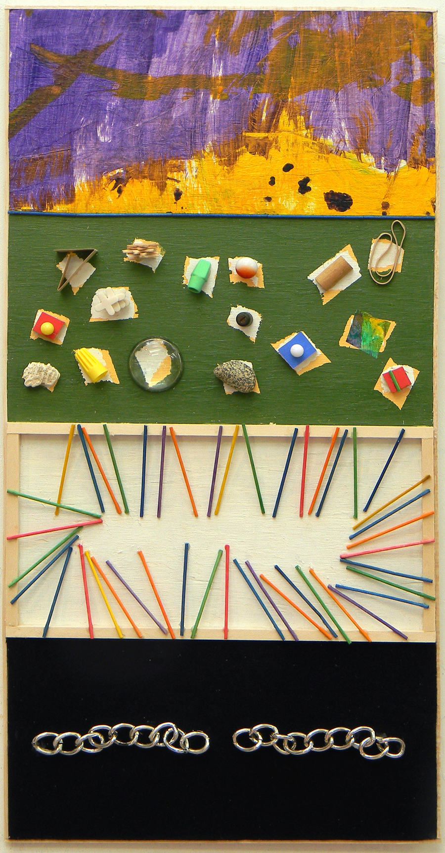 New Construction is 24 inches high and 12 inches wide. Painted tissue paper, green background for various objects glued into white areas, color sticks leaning into frame and cheap silver colored chain on black synthetic material.