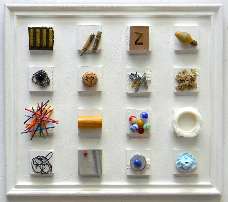 Objects glued to blocks that are glued to a board in a frame that is 15 inches x 17 inches.