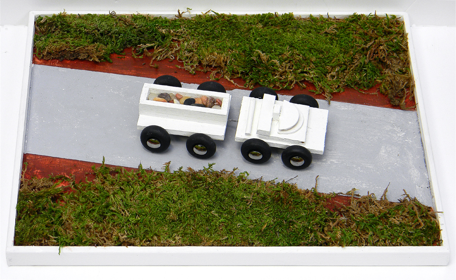 Construction is 10 inches x 13 inches x 2 inches.