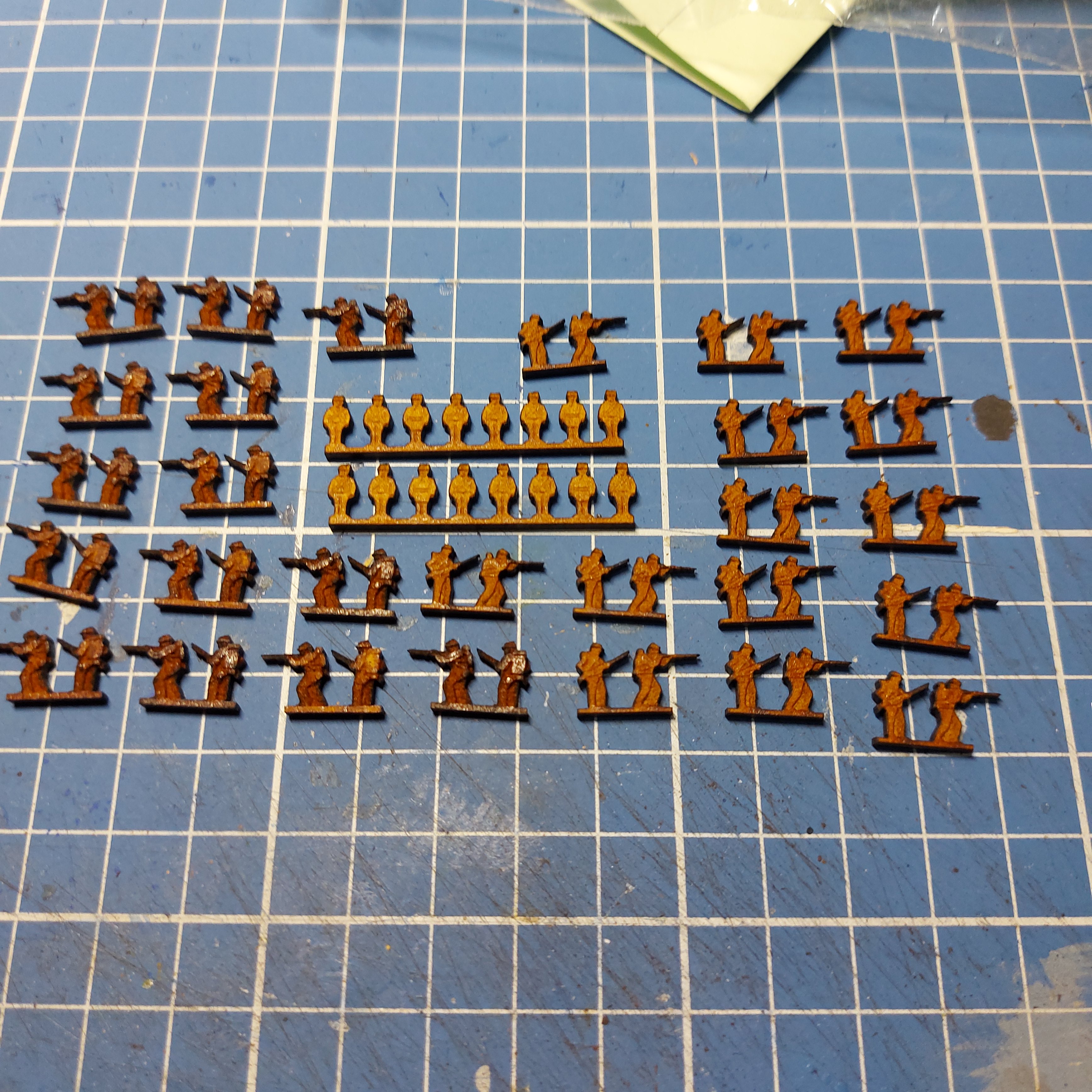 American Civil War kepi wearing infantry firing. The little round things are drums for the drummers