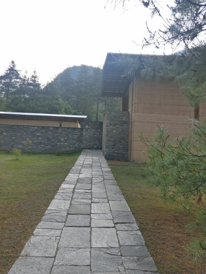 Rubble stone, rammed earth and timber walls