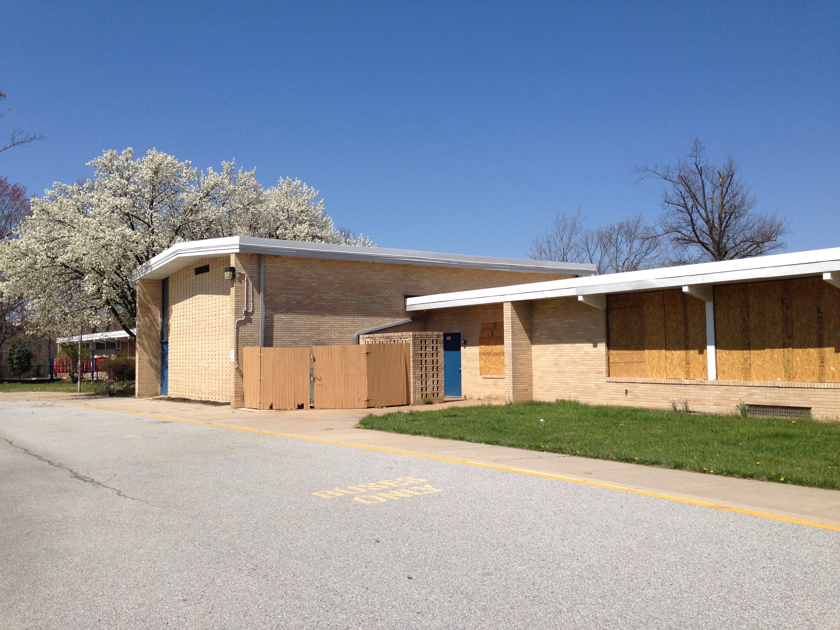 Bush School with boarded up windows