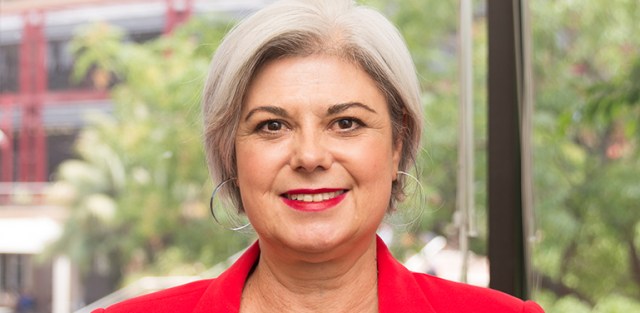 A person smiling for the camera

Description automatically generated with medium confidence