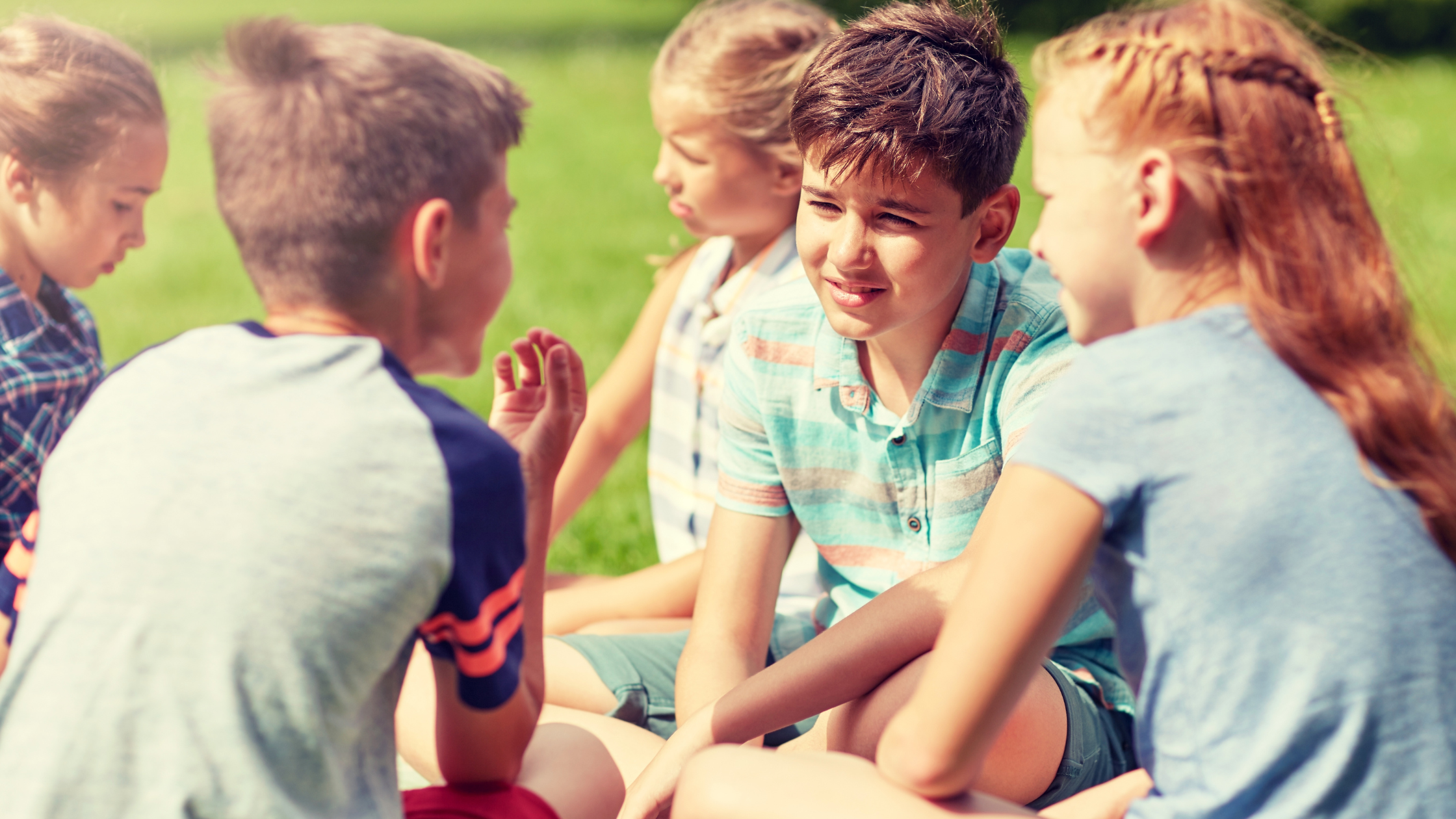 a group of kids having a discussion