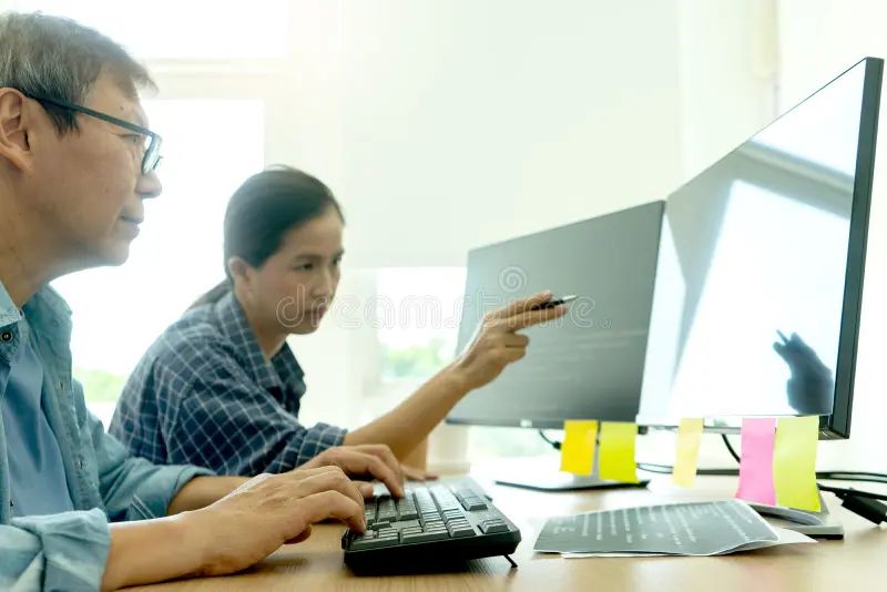 Senior Programmer Work With Developing Programming Stock Photo Image - Sunset Photo Collection - 8K Quality