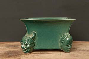 Semi-cascade pot with Noh masks – S 07