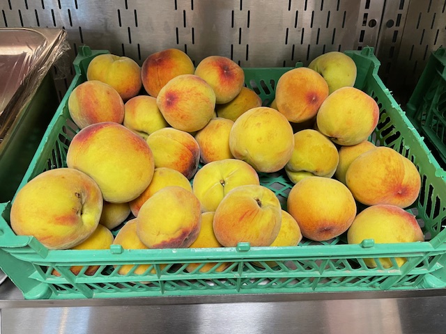 crate of peaches