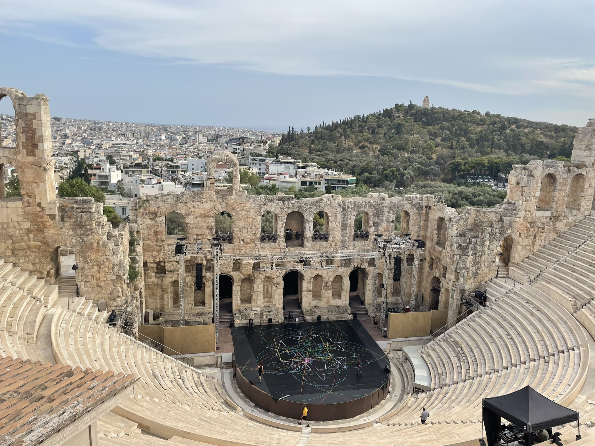 ruins of amphitheater, staged with modern equipment