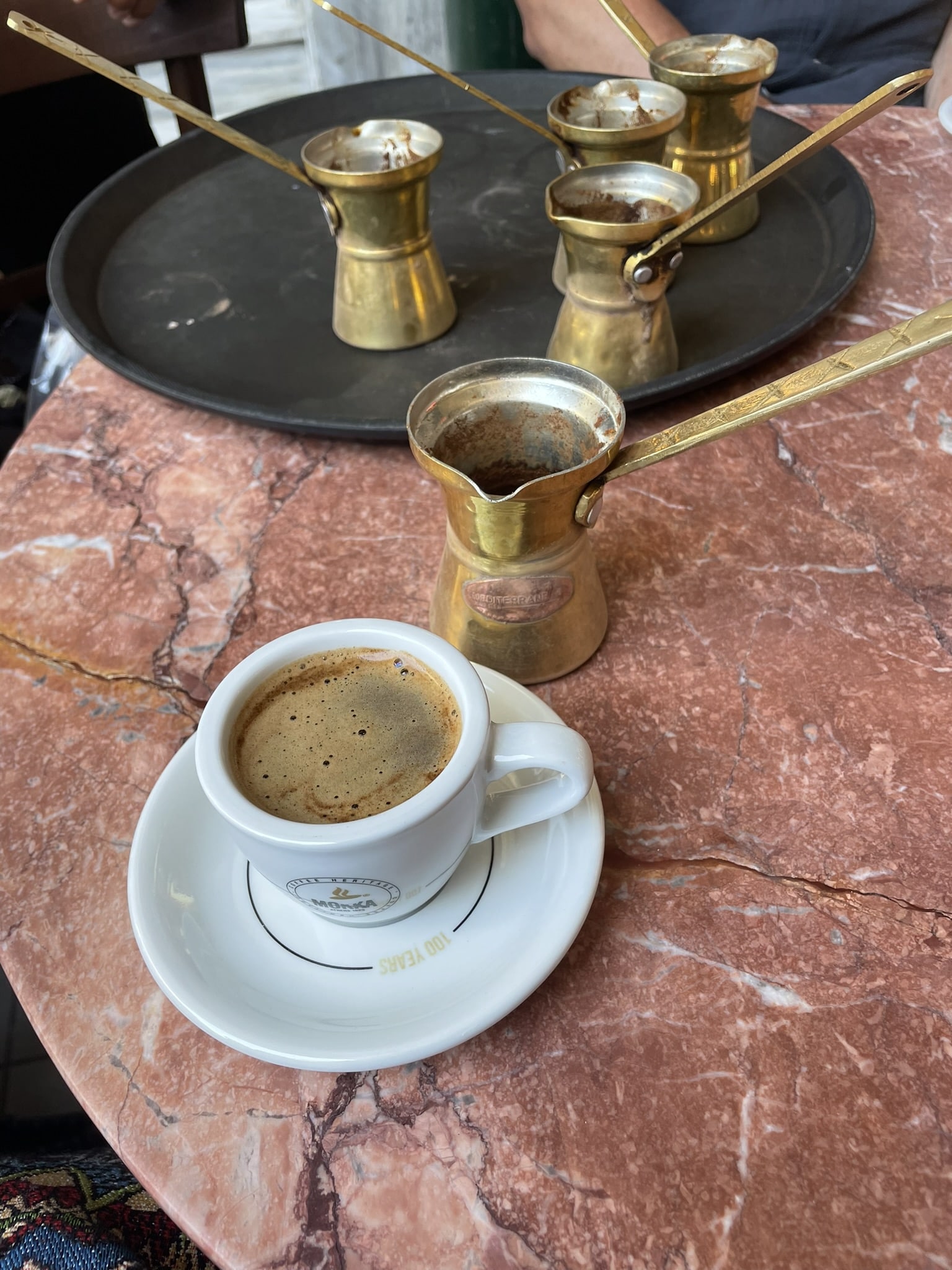 coffee served in small brass pots