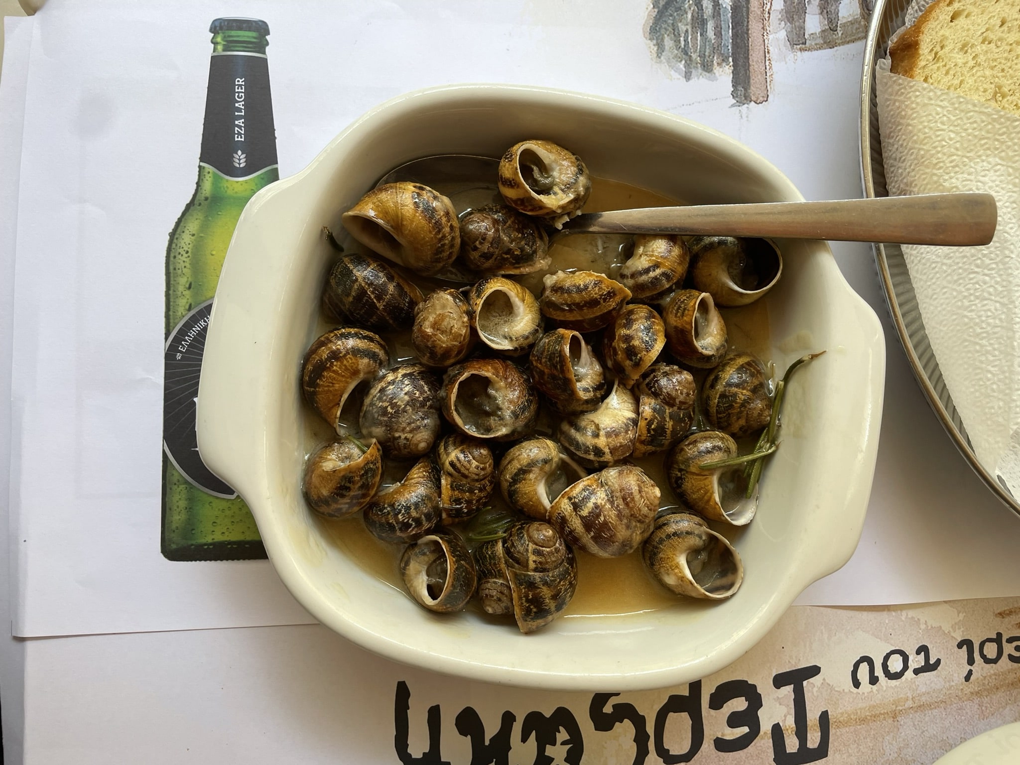 casserole dish filled with cooked snails