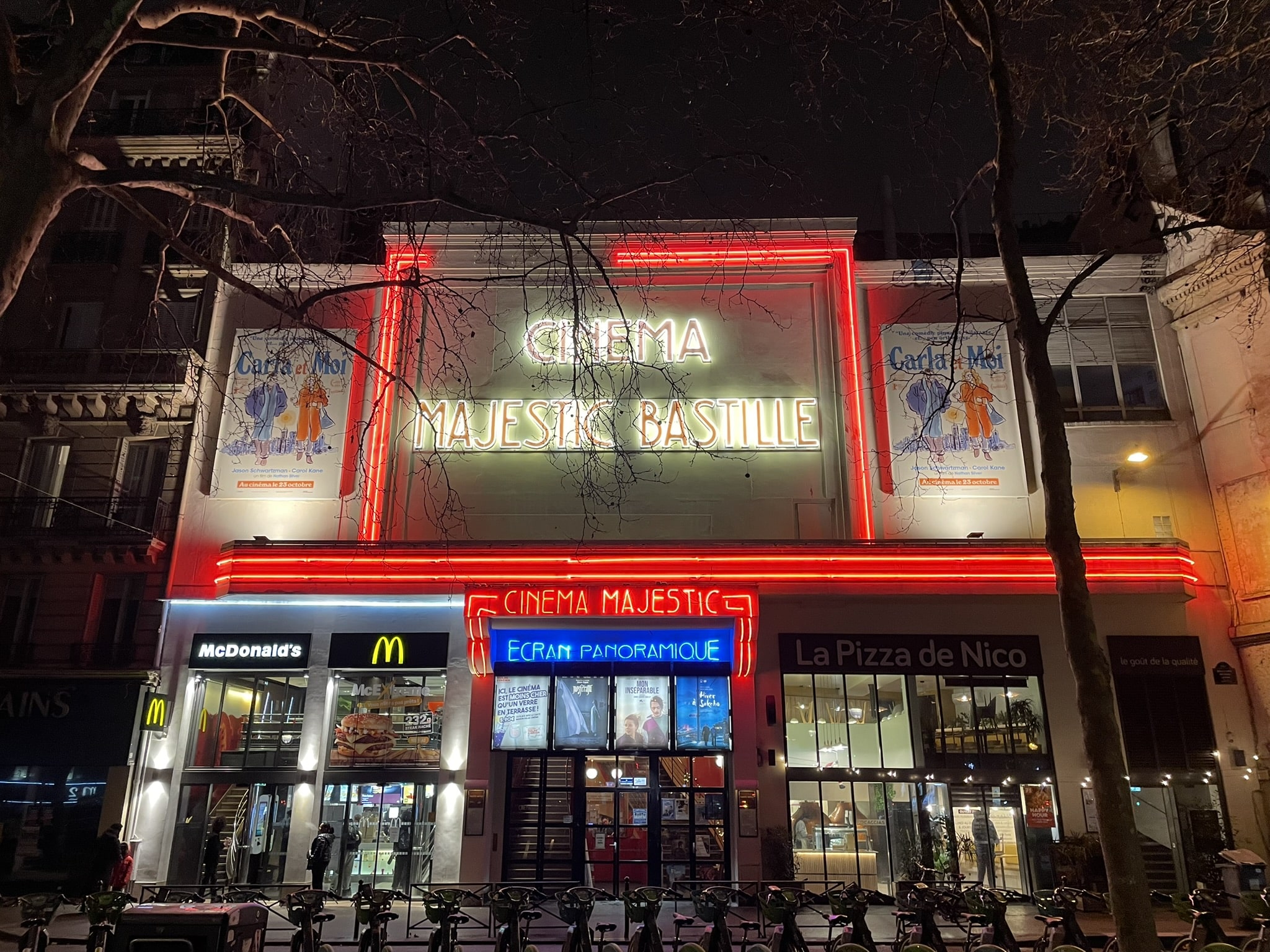 Nighttime outside of "Cinema Majestic Bastille"