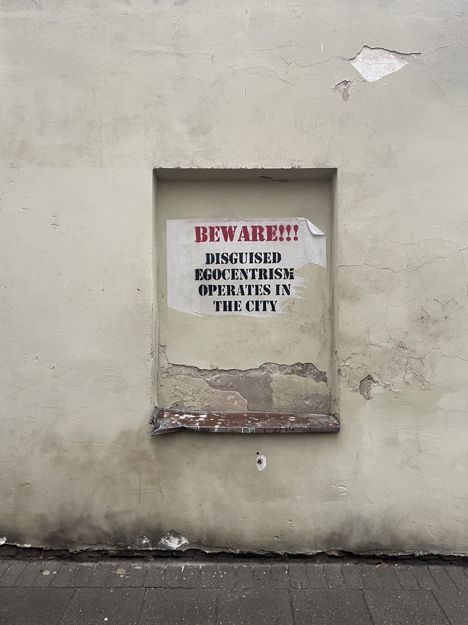 Sign reading" beware!!! disguised egocentrism operates in the city