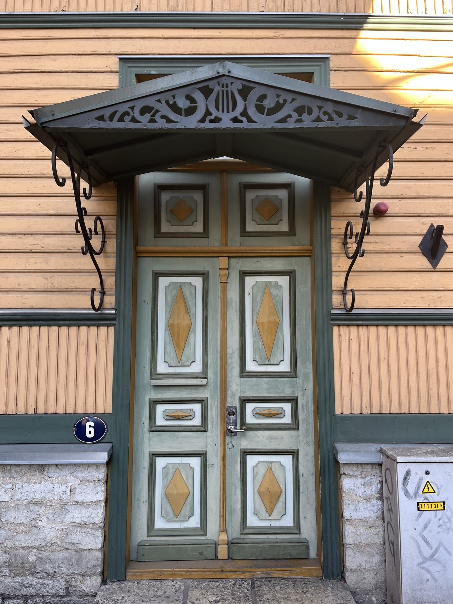 Doorway in green and gold