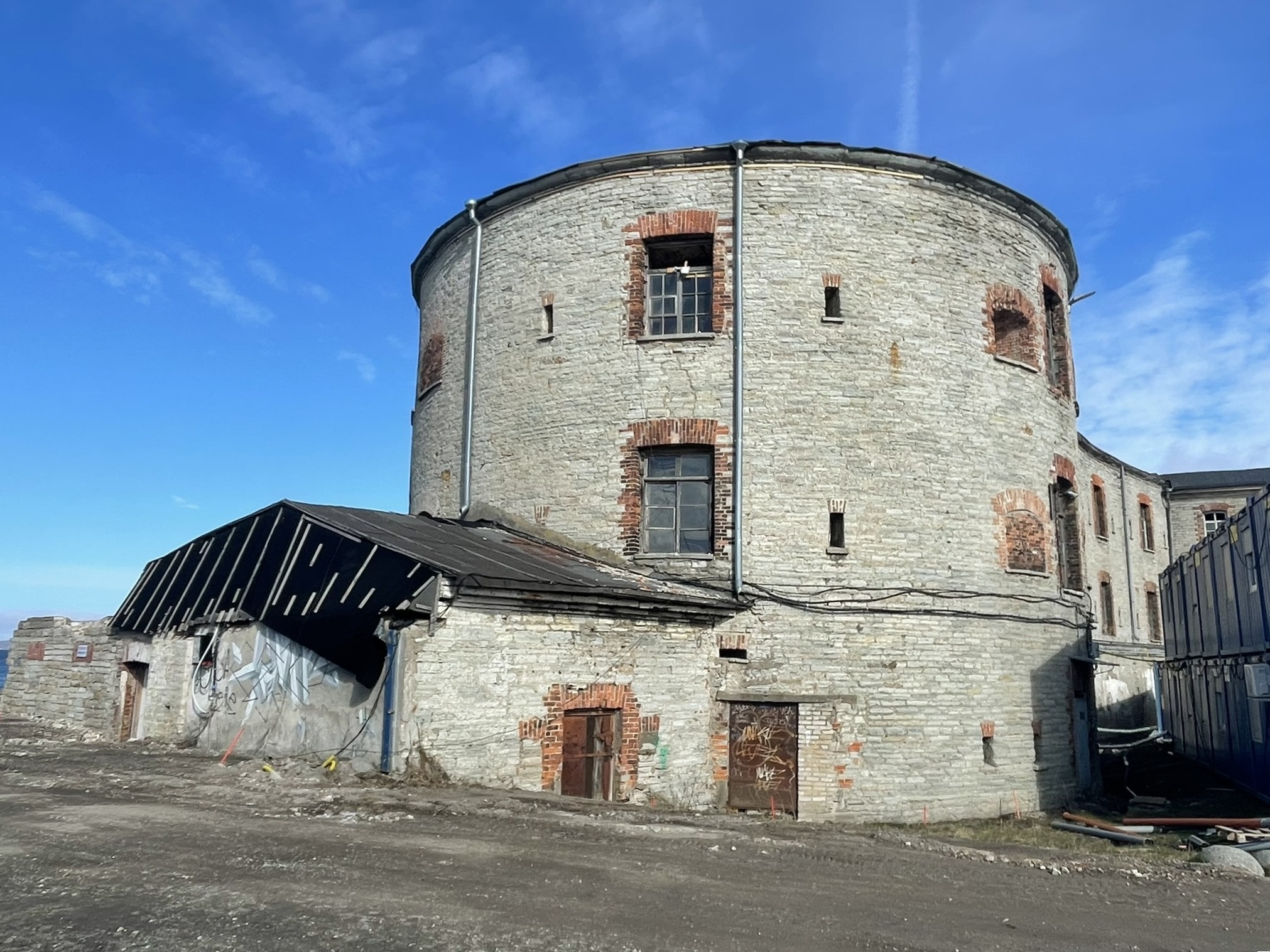 Wide three story limestone tower
