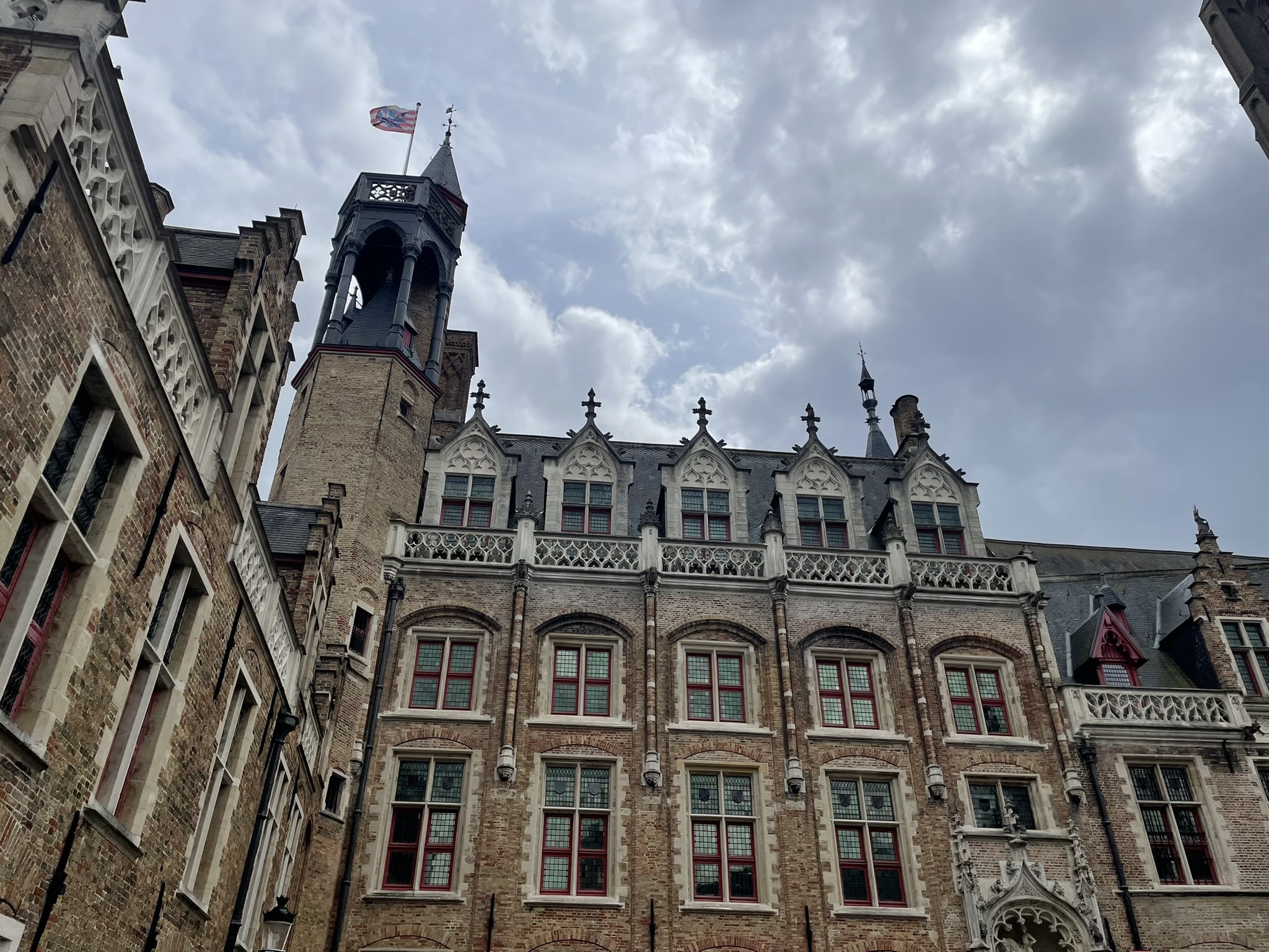 ornate brick building with arched gothic windows