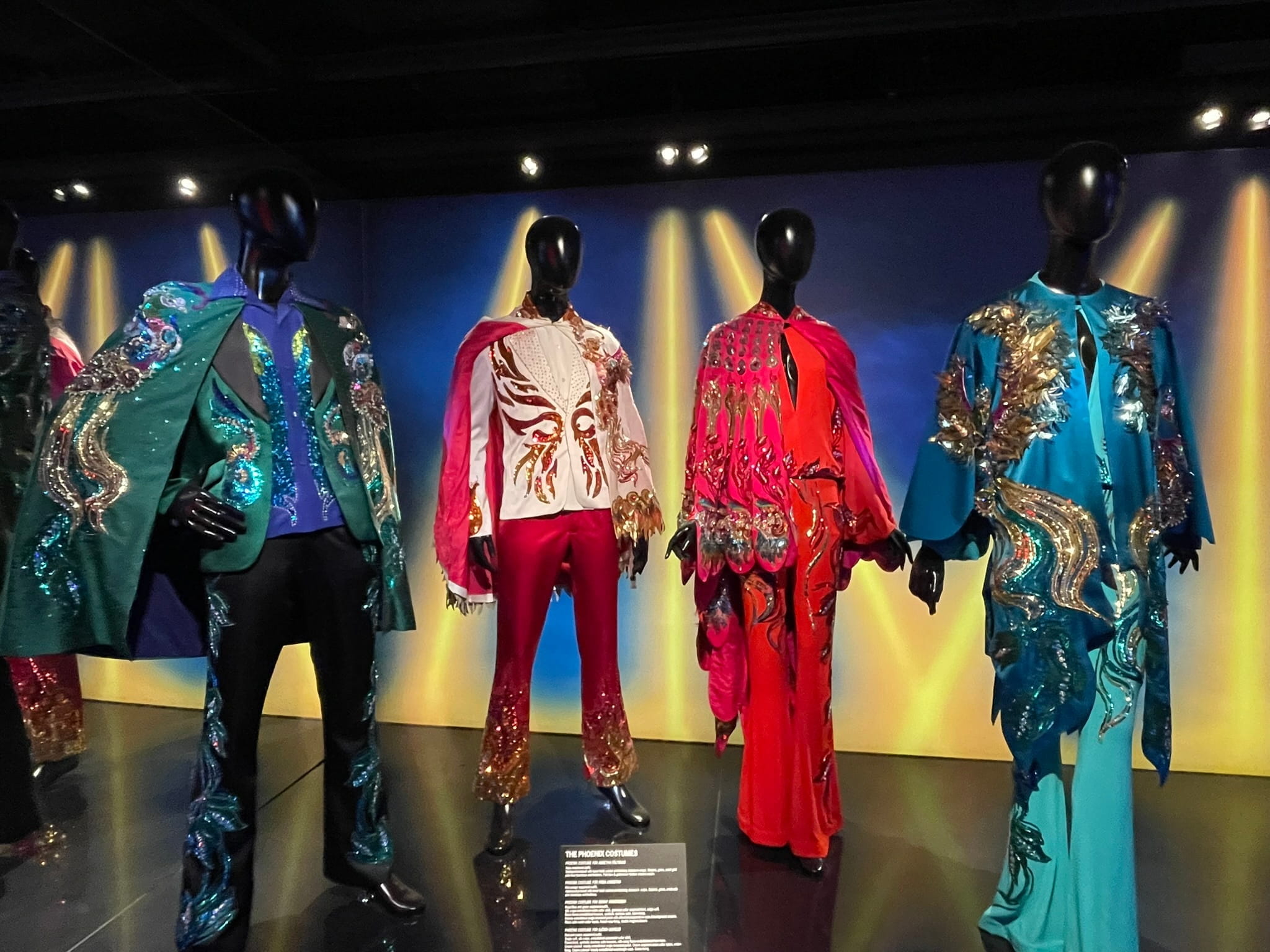 Costumes displayed on faceless manequins