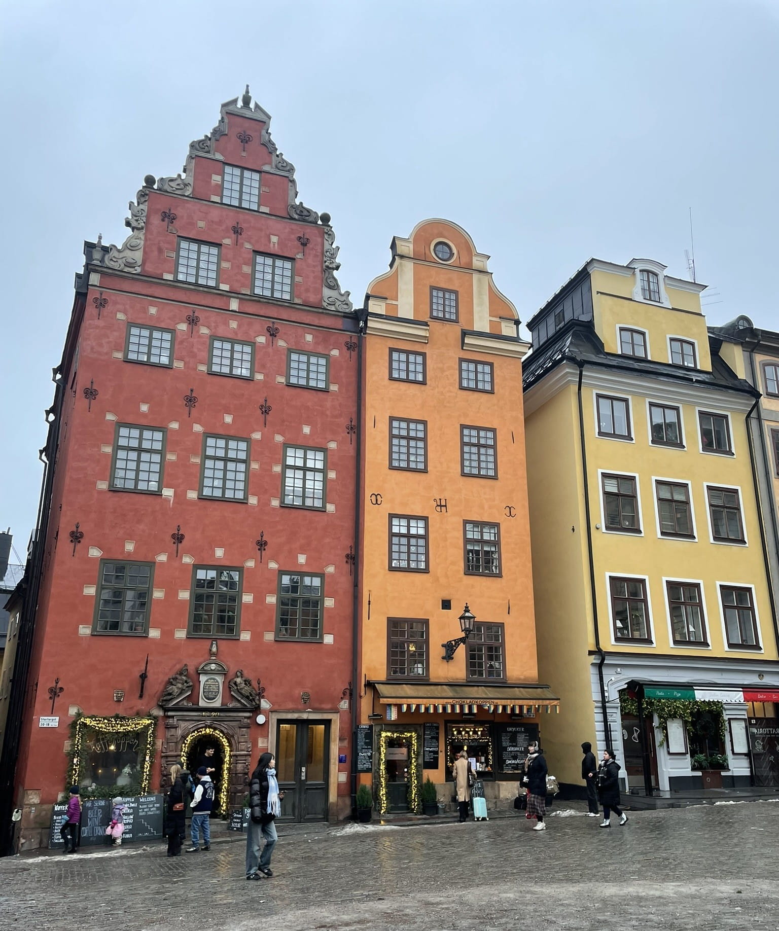 Old fashioned European buildings in red, orange, and yellow