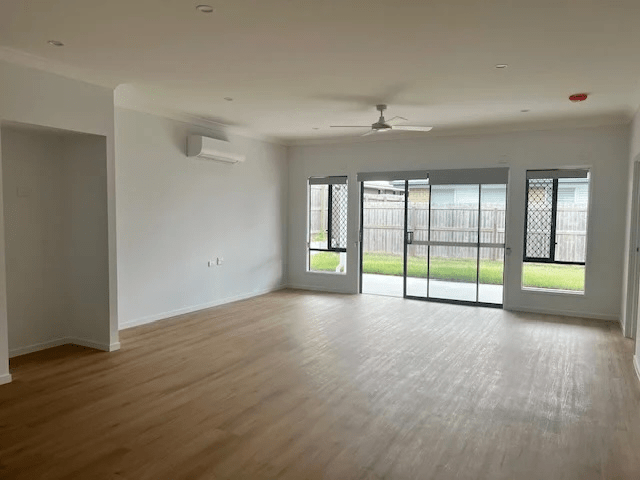 High Physical Support SDA home Ellen Grove - open plan kitchen and living area