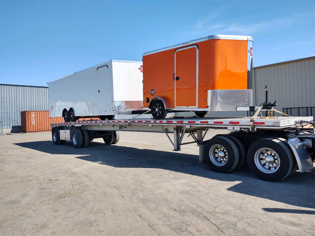 white and orange trailers