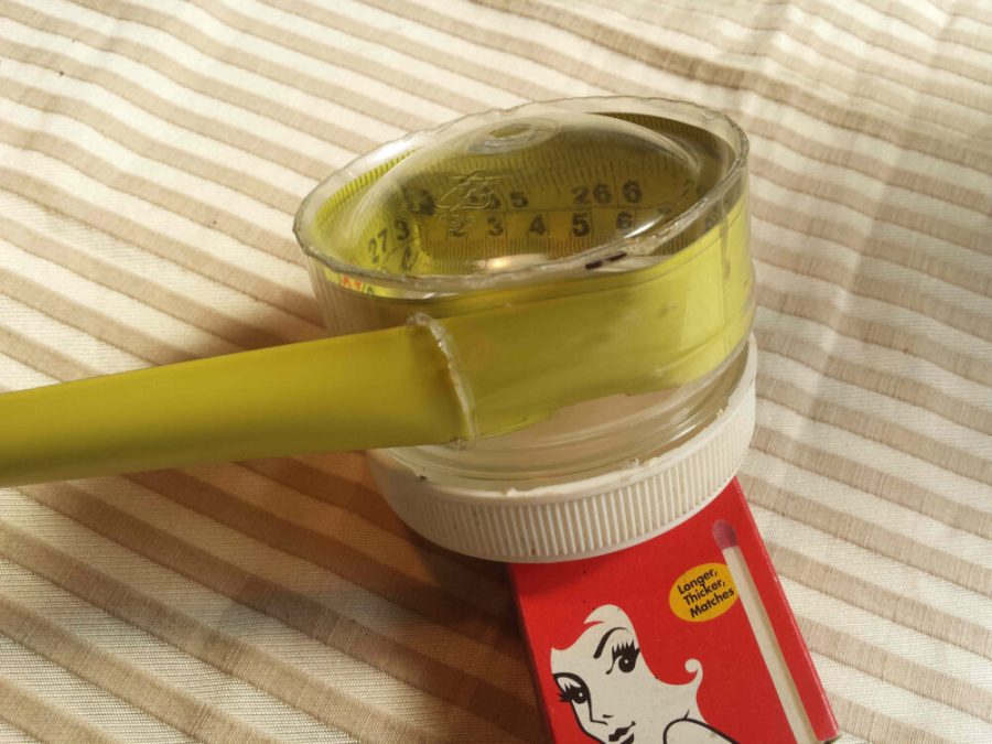 A roll up devices for storing unruly lengths of feisty steel tape in. It is a prototype and was made from a plastic peanut-butter jar. The container was shortened by cutting off the bottom and heat welding the bottom onto the shortened jar. with the above hot knife.