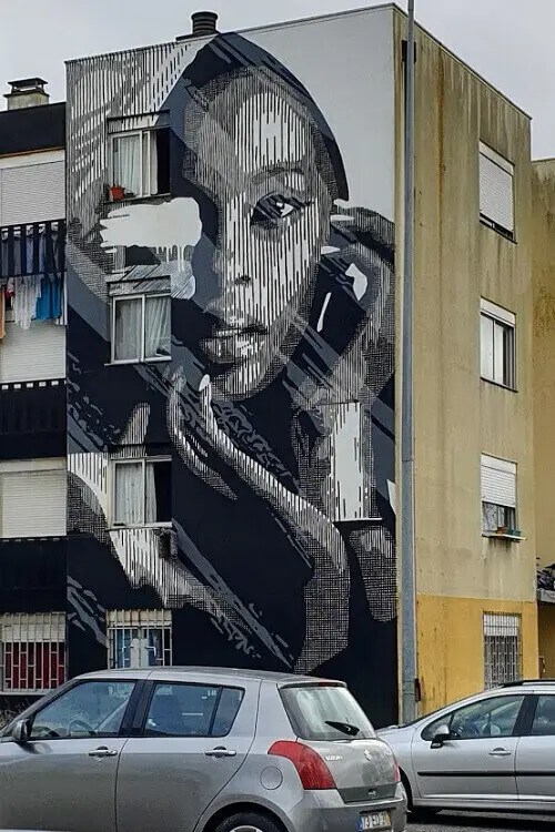 Street art by Huariu in Quinta do Mocho, Lisbon