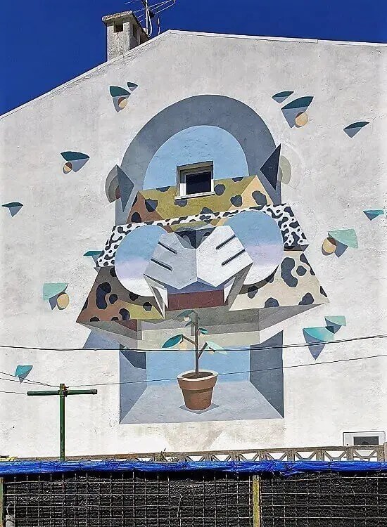 Street art by Low Bros Street Art in Bairro Padre Cruz, Lisbon