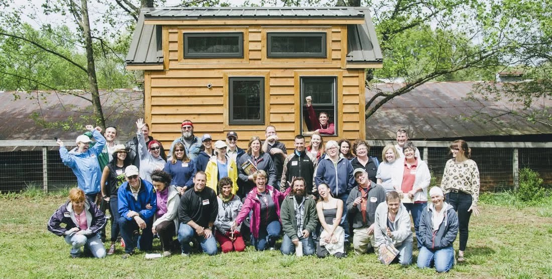 Group of people in front of Tiny House