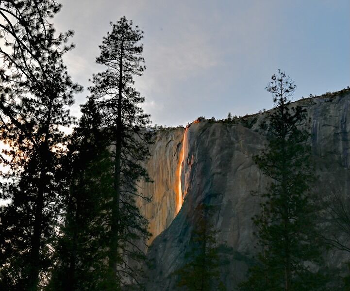 Firefall at Yosemite National Park 2025 showing Horsetail Fall glowing red against cliffs.