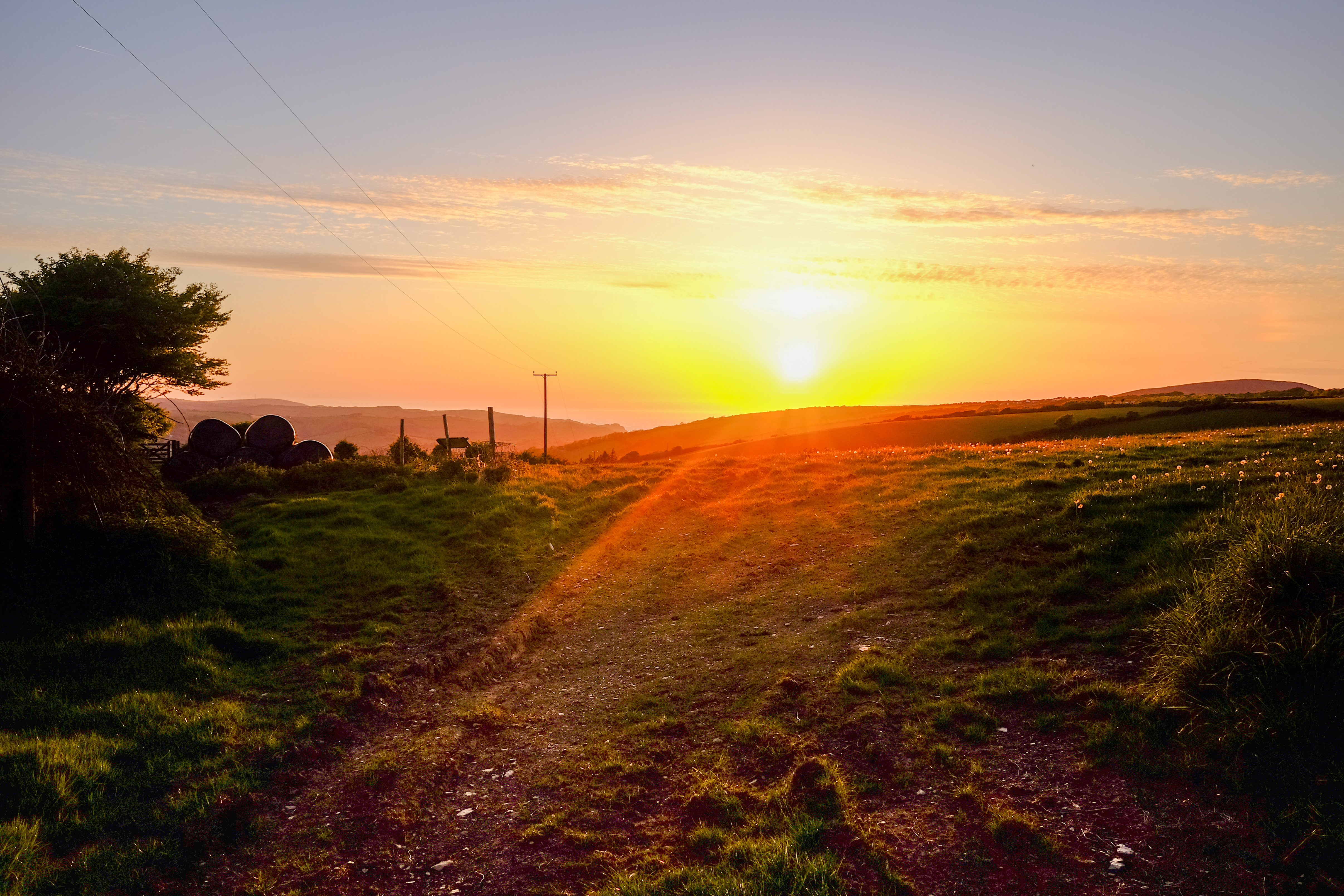Countryside landscape of sunset in Combe Marten, Devon UK
