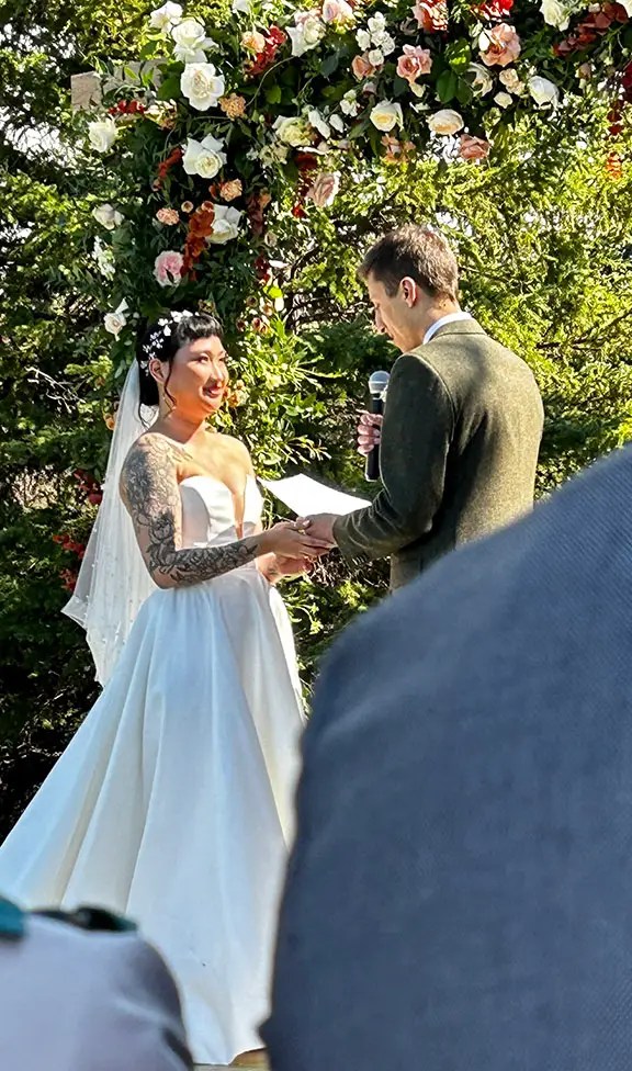 Exchanging vows at Wedding, Pine and Pond, Ponoka, Alberta