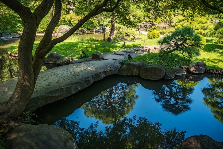 stone bridge in kyu-furukawa gardens in northern tokyo