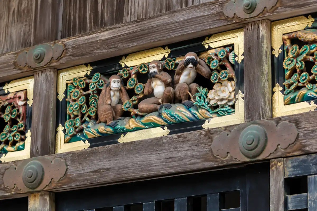 Three Wise Monkeys carving at the Sacred Stable of Nikko Toshogu Shrine