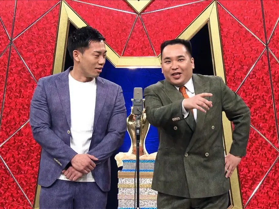 Two manzai comedy performers on stage.