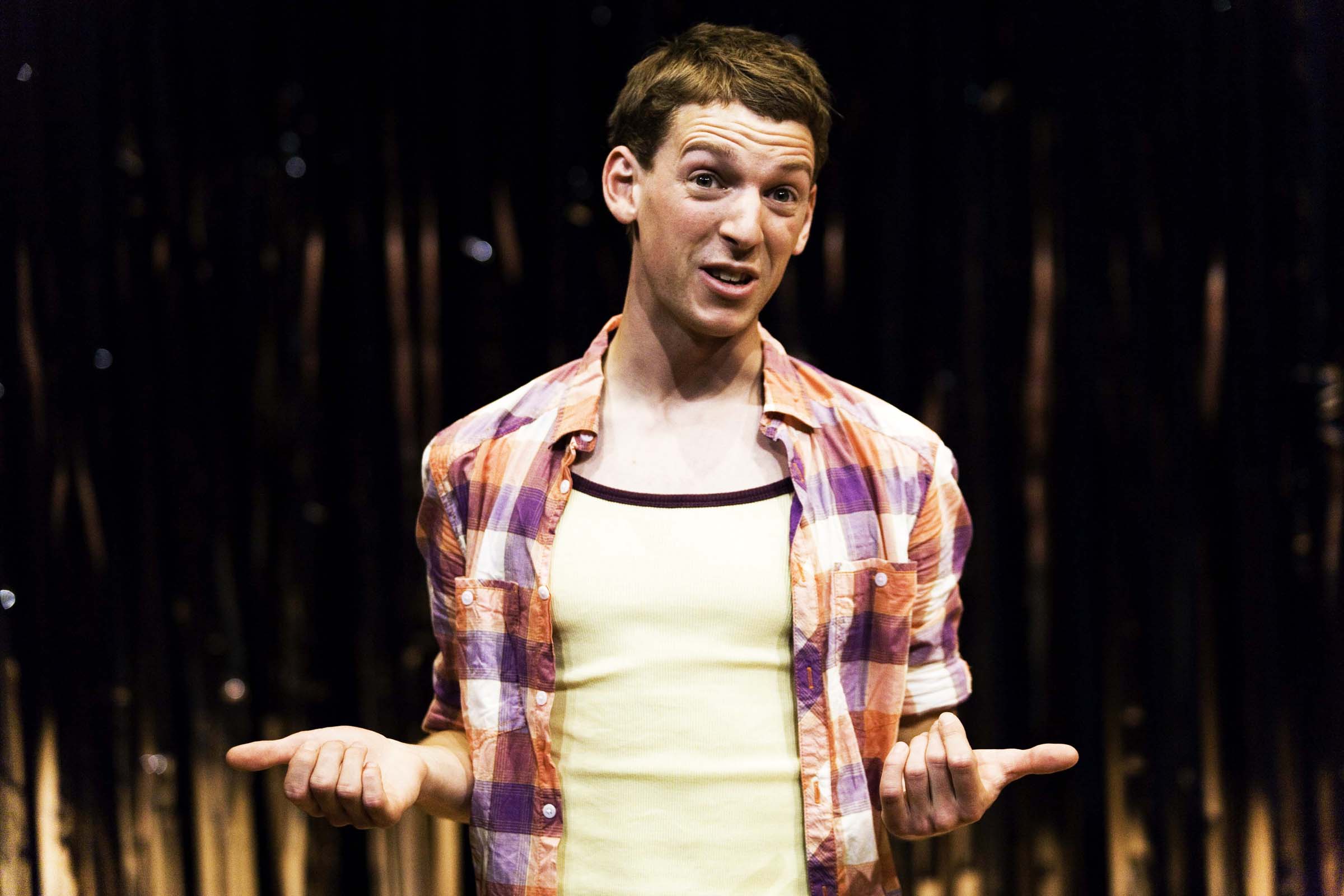 Dylan Kennedy (Seán) in All Over Town. Photo by Fiona Morgan
