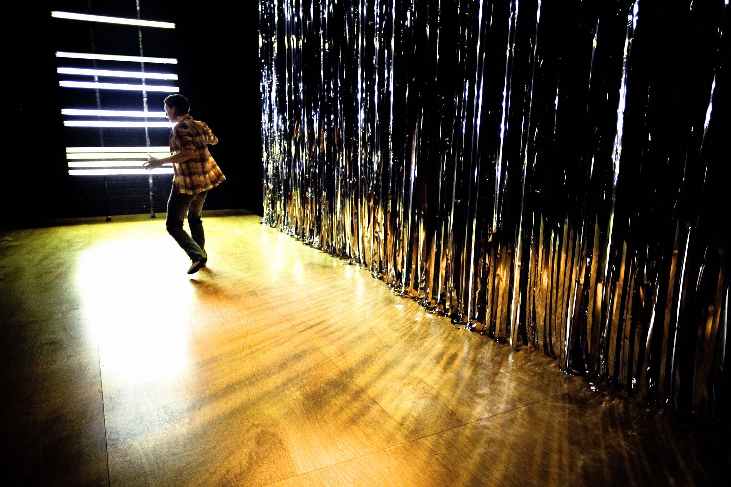 Dylan Kennedy (Seán) in All Over Town. Photo by Fiona Morgan