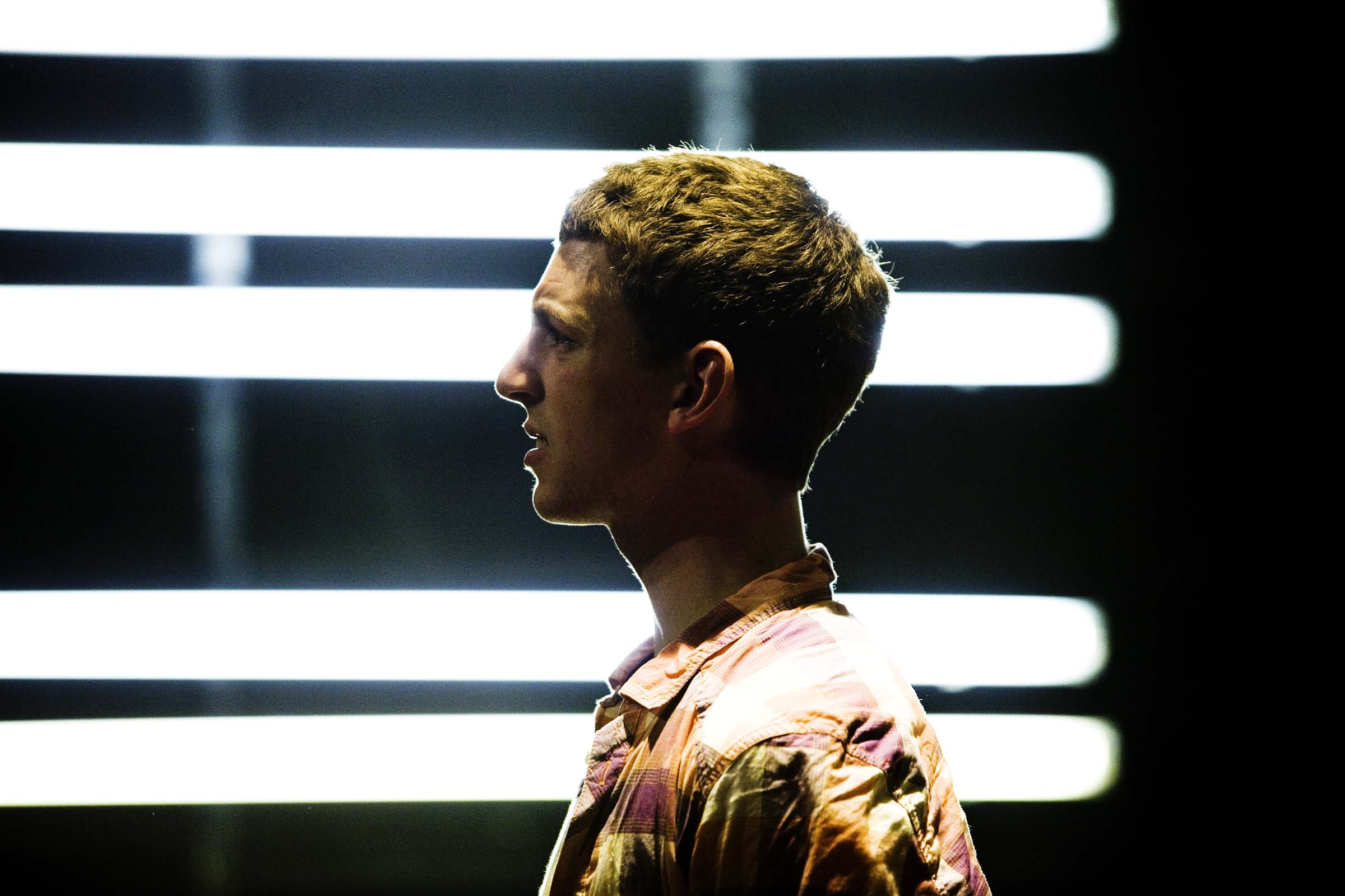 Dylan Kennedy (Seán) in All Over Town. Photo by Fiona Morgan