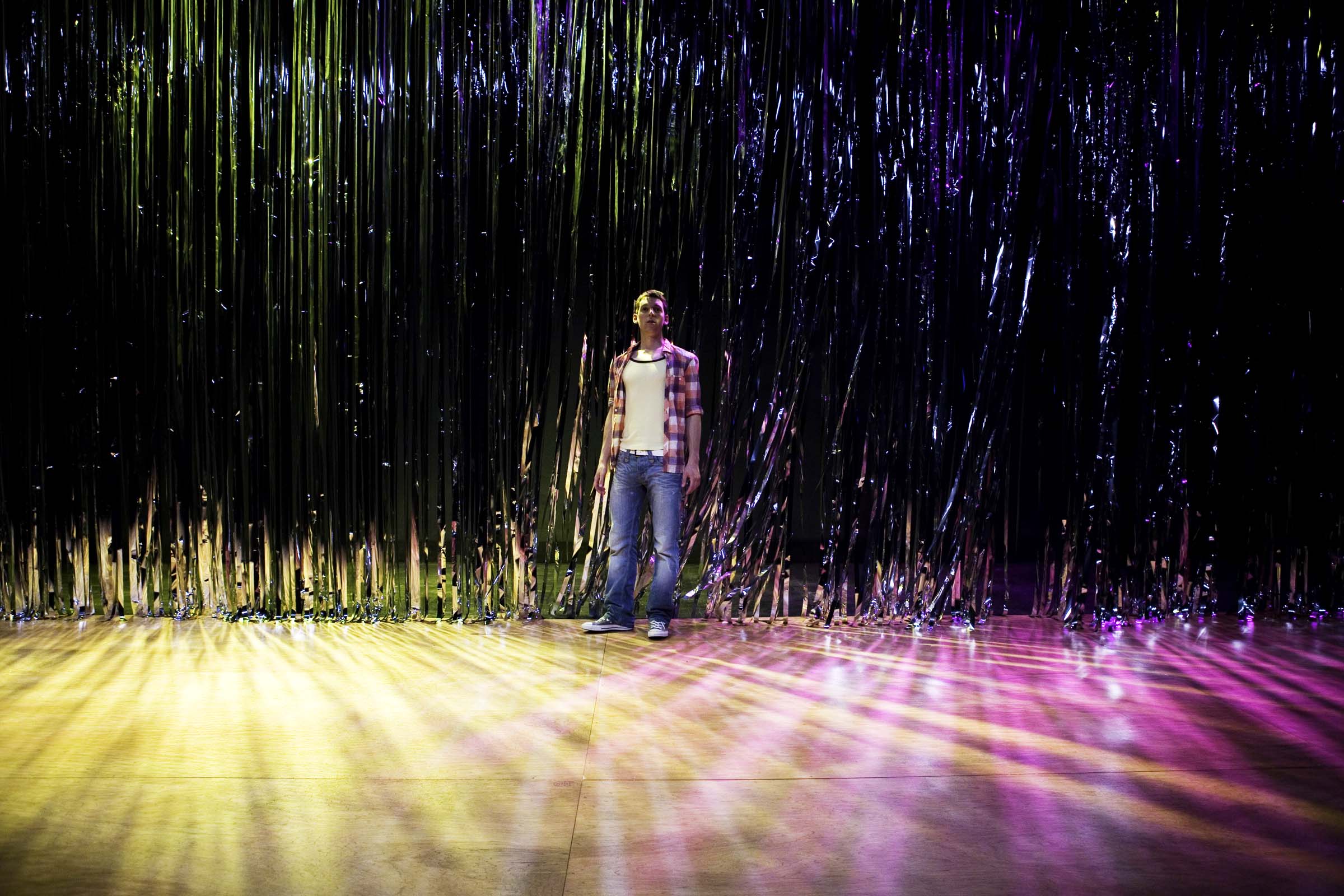 Dylan Kennedy (Seán) in All Over Town. Photo by Fiona Morgan