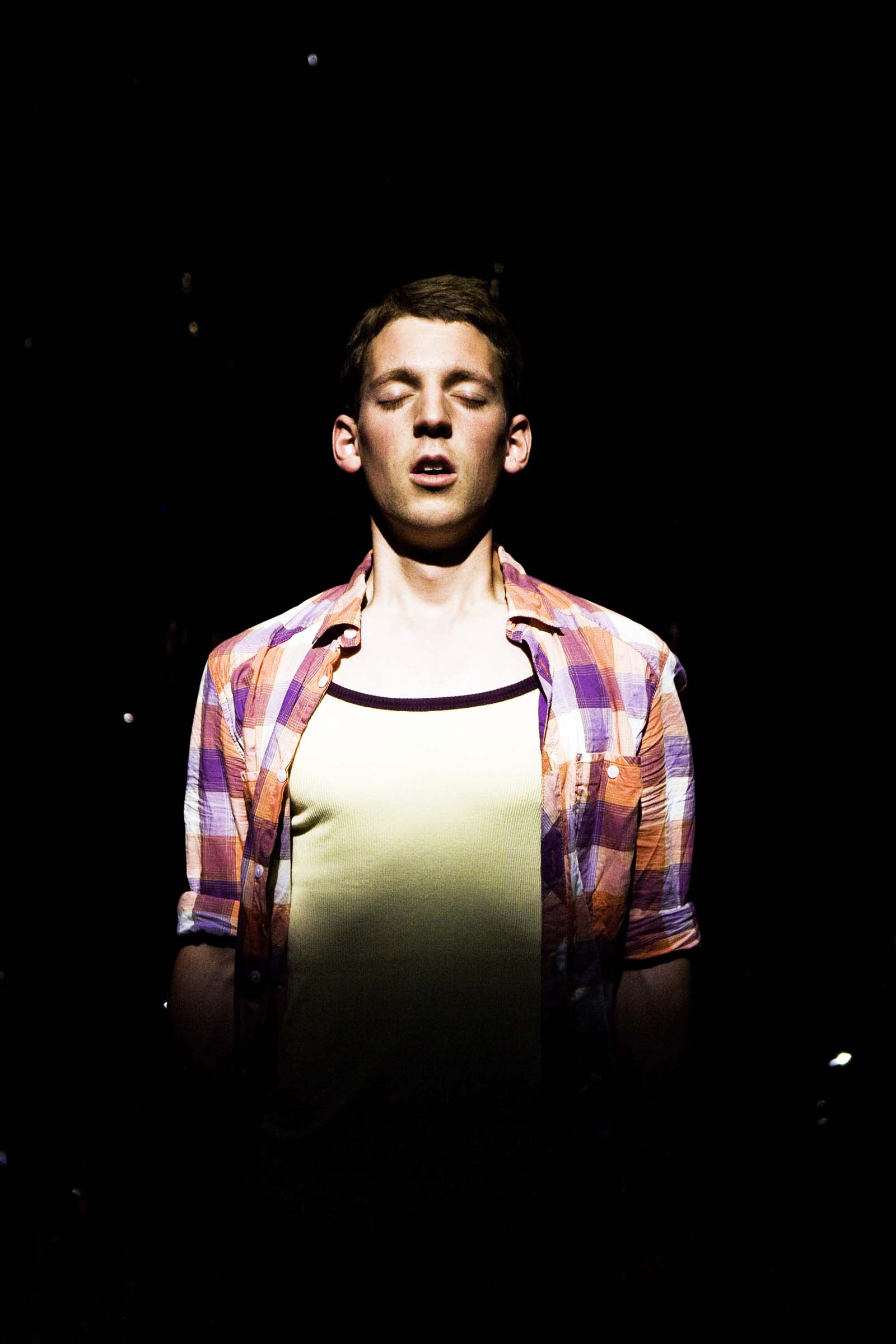 Dylan Kennedy (Seán) in All Over Town. Photo by Fiona Morgan