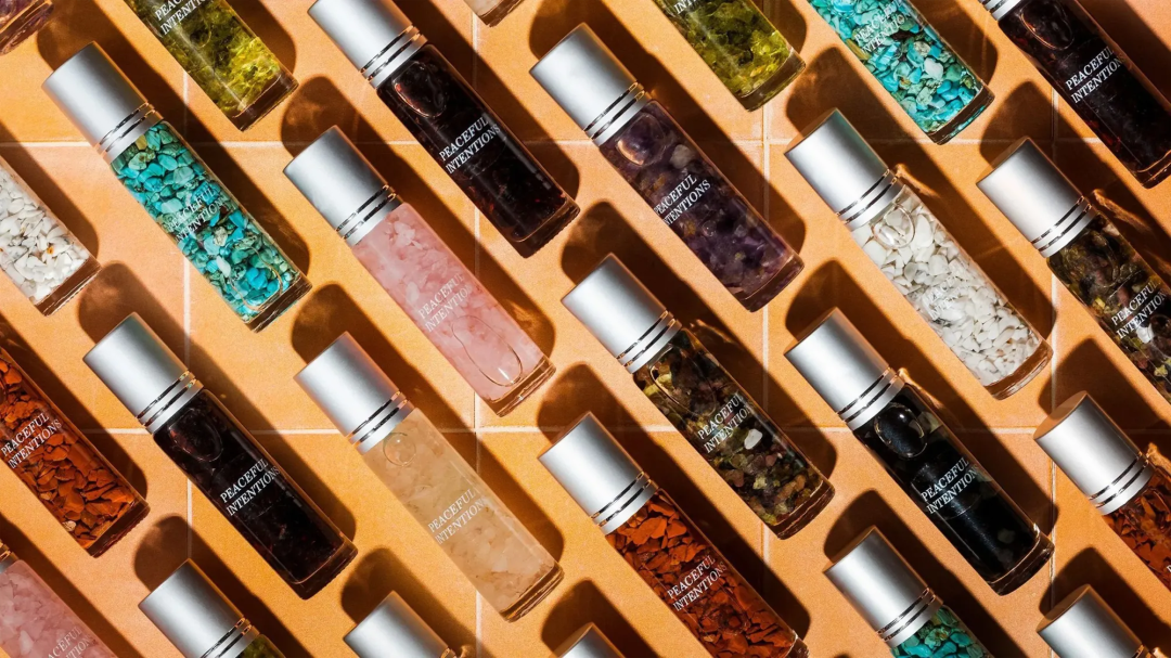 Gem infused essential oils product photography