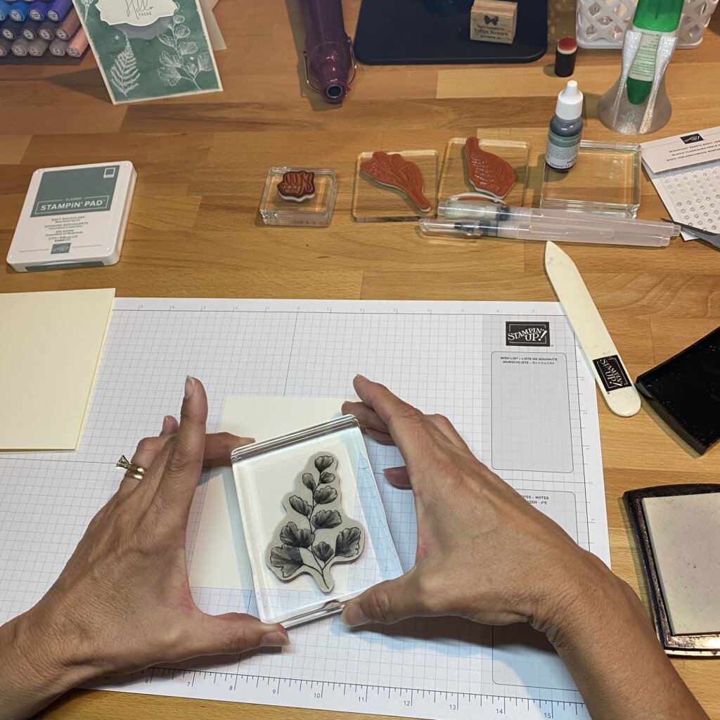 Stamp images onto watercolor paper using Versamark ink