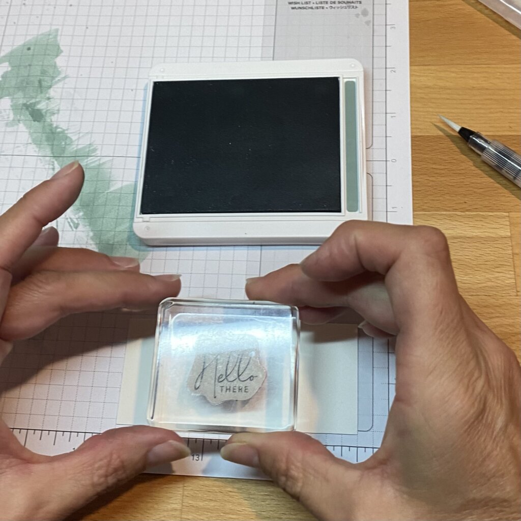 Stamp sentiment onto watercolor paper scrap