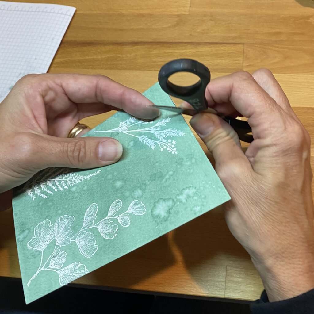 "Rough" the edges using blade of scissors