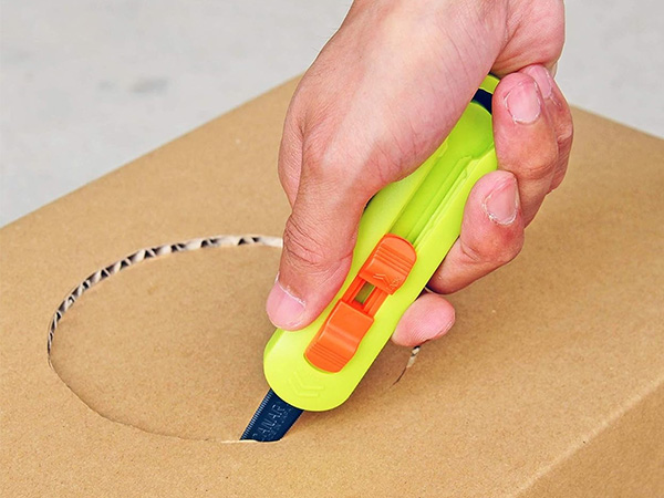 Canary Retractable Packaging Opening Tool in Use