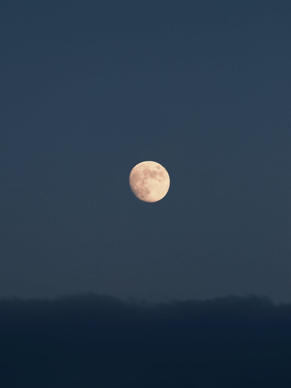 full moon on a dark sky