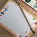 Image shows a Notepad and a box of Sprout Pencils